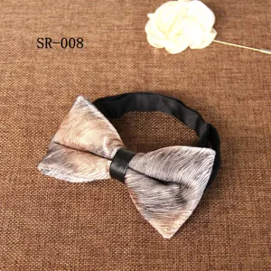 Detailed view of men velvet bow tie with animal print, perfect for wedding suit accessories.