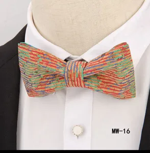 Close-up view of a stylish cork bow tie featuring colorful striped patterns and neat texture.