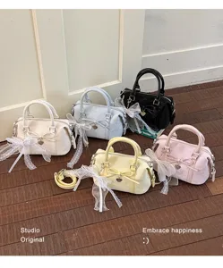 Chic multi-color handbag set with lace bow and heart charm, perfect for daily commuting.