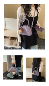 Purple bowling shoulder bag with cute puppy pendant, stylish leather handbag for daily wear.