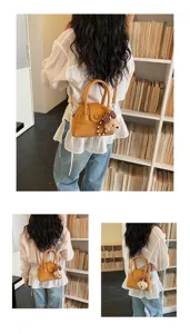 Stylish women's bowling shoulder handbag with cute bear pendant, trendy small crossbody bag.