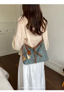 Geweven schoudertas voor dames, retro casual crossbody emmertas met kwastjes en leer.