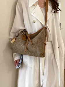 Zomerse geweven stro schoudertas voor dames, casual strand hobo tas met stijlvol kwastjes ontwerp.