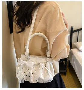 White polka dot pleated shoulder bag, soft leather handbag with cute bow and pearl decor.