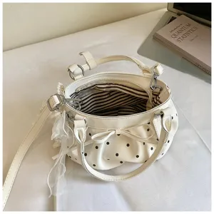 Stylish white polka dot PU leather handbag for women, soft cloud shoulder crossbody bag.
