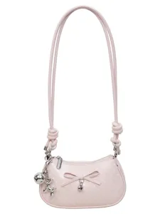 Pink polka dot underarm shoulder bag for women, cute bow and charm design handbag.