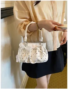Chic pleated polka dot handbag featuring delicate pearls and bow, soft leather women cloud bag.