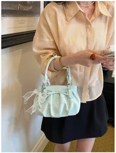 Light blue polka dot handbag with bow and pearl, soft leather cute shoulder bag for women.