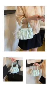 Pleated polka dot handbag for women, fashion soft leather cloud bag with bow and pearl detail.
