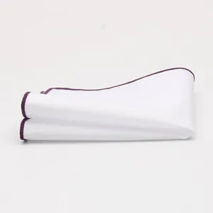 Men's cotton white pocket square with purple edge, perfect suit accessory detail view.