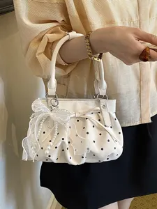 Women's pleated polka dot handbag fashion soft leather cloud bag with bow and pearl decor.
