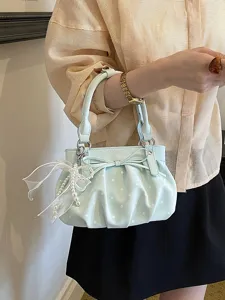 Ruched polka dot handbag for women, trendy soft leather cloud bag with bow and pearl charm.