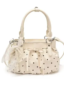 Chic ruched polka dot handbag for women, elegant soft leather cloud shoulder crossbody bag.