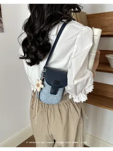 Stylish denim mini crossbody bag for women, vintage single-shoulder phone pouch with flower.