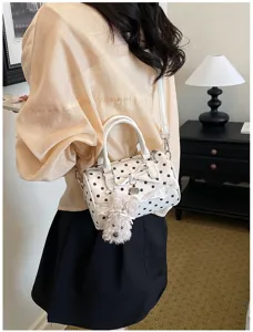 Sweet white polka dot pillow bag with lace trim, cute bow and fluffy dog charm for women.