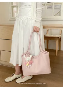 Pink tote bag for women, large capacity shoulder bag with cute bear charm for daily use.