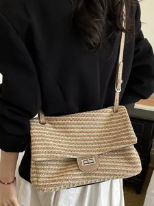 Bolso cruzado de paja tejida para mujer, bolsa de hombro casual de verano con cierre metálico.