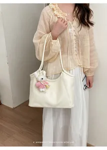 Classic creamy white tote bag for women, large capacity shoulder bag with cute rabbit charm.