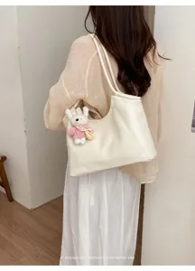 Minimalist large capacity shoulder tote bag with cute knitted rabbit pendant for women daily use