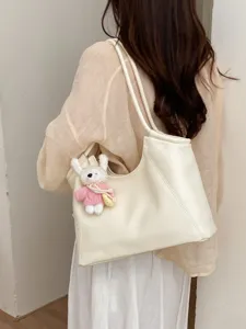 Women large capacity shoulder tote bag, trendy niche design leather handbag for daily wear.