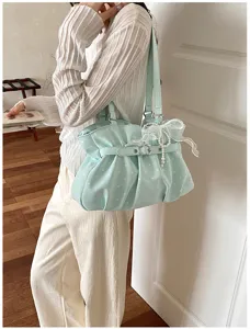 Green polka dot pleated shoulder bag, stylish casual tote bag with cute bow pearl pendant.