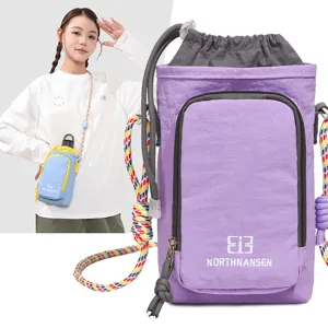 Lightweight kids crossbody phone and water bottle bag with colorful braided strap for travel