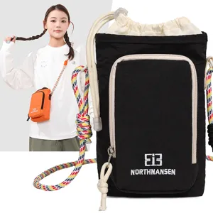 Kids lightweight crossbody phone bag, drawstring pouch with colorful strap for travel use.