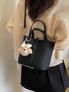 Schwarze PU Leder Eimer Tasche mit Plüsch Hund Anhänger, stilvolle Umhängetasche für Damen Alltag.