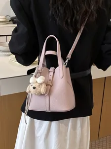 Schicke rosa Damen Eimer Tasche mit süßem Hund Anhänger, vielseitige Umhängetasche.