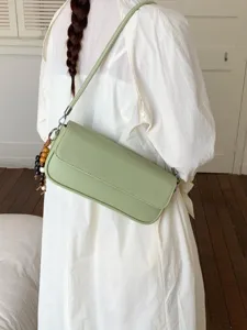 Korean niche versatile small square bag, fashionable commuter shoulder messenger bag for women.