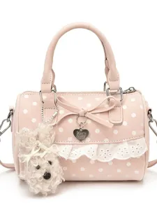 Charming sweet pink polka dot handbag featuring lace trim, cute bow, and fluffy puppy charm.