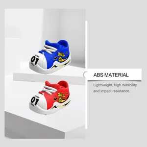 Jouet compact de chaussure de football catapulte pour enfants, sneaker portable en plein air.
