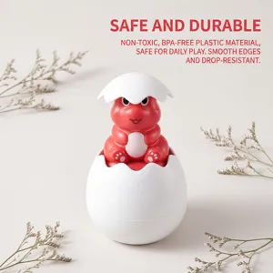 Red cartoon dinosaur egg baby bath toy, safe non-toxic plastic for kids bathroom fun.