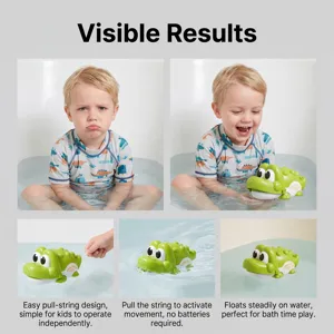 Pull-string green crocodile bath toy, floats on water and swims with simple pull action.