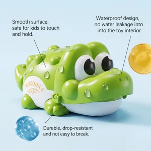 Cute green crocodile bath toy for kids, waterproof cartoon animal design for water play.