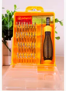 Detailed view of the 31-in-1 precision screwdriver set showcasing bits and ergonomic yellow handle.