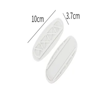 Detail view of the oval power strip holder bracket, showing compact size and sturdy plastic build.