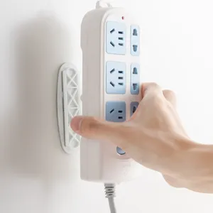 Punch-free oval power strip wall holder socket fixer sticky mount bracket for home organization
