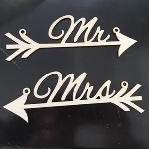 Wooden Mr Mrs arrow sign wedding decoration photography prop detail view, rustic party decor.
