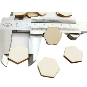 Natural wood hexagon craft chips for DIY handmade painting and home decoration projects.