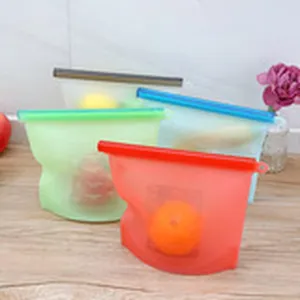 Reusable silicone food storage bags with airtight sealing bars for kitchen fridge organization.