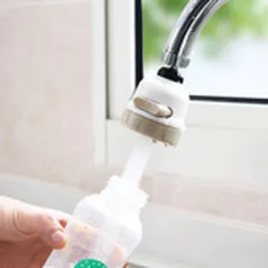 Kitchen faucet extender detail shot showing water saving aerator and splash proof sprayer design.
