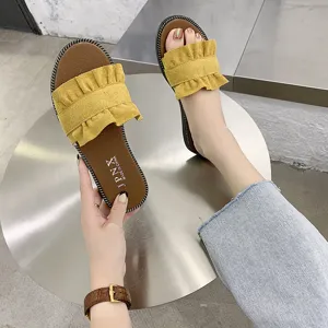 Stylish summer women's flat sandals with cute ruffles, casual beach slip-on shoes for daily wear.