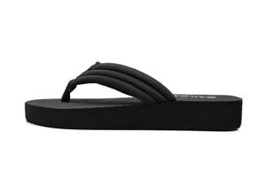 Tongs compensées noires pour femmes, sandales plates élégantes en tissu pour la plage d'été.