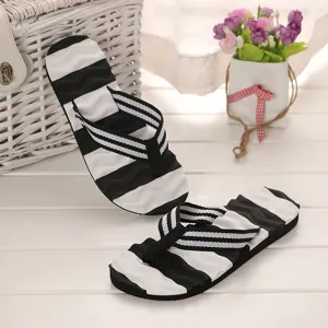 Damen schwarz weiß gestreifte Zehentrenner lässige Strandsandalen bequeme Sommerschuhe flach