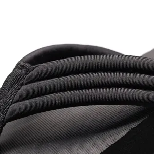 Black wedge flip-flop sandals with braided fabric strap, summer beach footwear design.