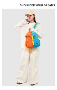 Color-blocked kids outdoor travel backpack with adjustable straps and bright orange and blue.