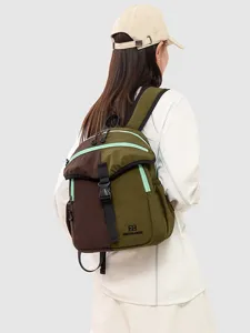 Stylish colorblock backpack with secure buckle closure, ideal for outdoor travel and daily use.