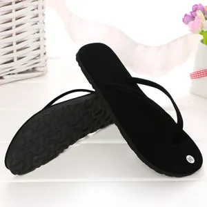 Schwarze lässige Zehentrenner für Damen, minimalistische Sohle mit Antirutsch.