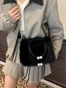 Stylish black faux fur plush handbag for women, versatile shoulder crossbody bag main view.